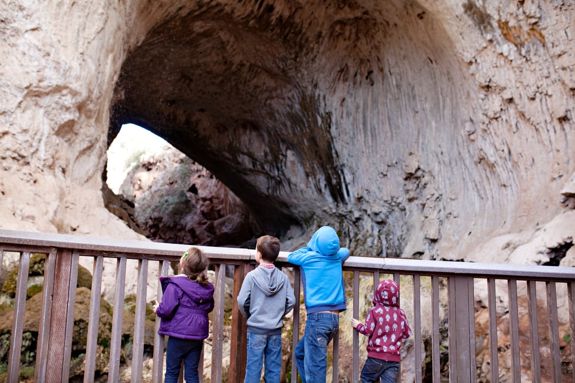 Children Looking at a Cave